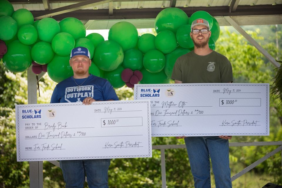 Brady Buck and Matthew Otte holding their 2024 Blue-Collar Scholars checks